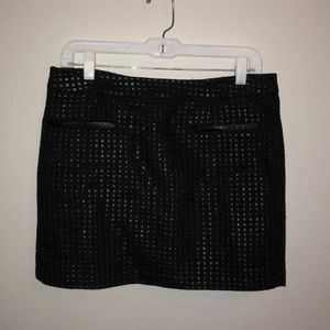 Black textured mini skirt
